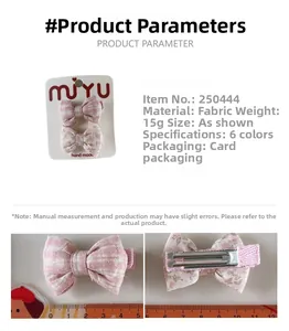 Close-up of pink striped and floral fabric bow hair clips on display card