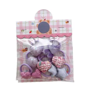 Set de 10 élastiques à cheveux pour filles avec cœurs en tweed rose et étoiles brillantes