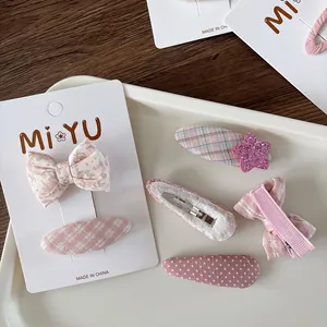 Pink floral fabric bow hair clips for girls set with polka dots and stars on white card