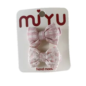 Set of 2 sweet floral and plaid cotton fabric bow hair clips for girls on display card