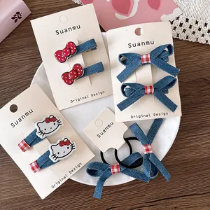 Cute denim and red polka dot bow hair clips and elastic ties set for young girls