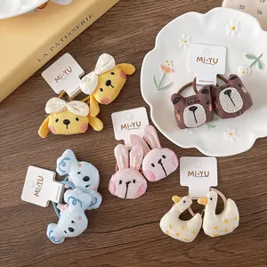 Detailed view of cute embroidered plush animal hair ties with elastic bands for girls