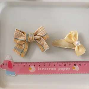 Süße gelbe Stoff-Schleifen-Haarklammern mit Perle für Mädchen-Haarschmuck im Set