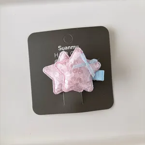 Pince à cheveux étoile rose pailletée pour fille avec petit nœud bleu