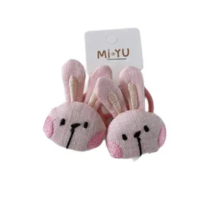Cute cartoon pink plush bunny hair ties with embroidery details for girls on display card