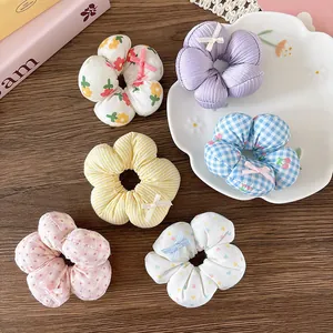 Set di sei elastici per capelli in cotone floreale con fiocchi in vari colori e motivi