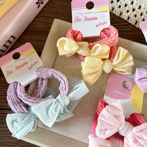 Lot de chouchous à nœuds pastel avec boucles en éponge à haute élasticité pour filles