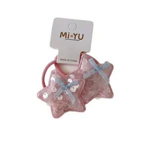 Paire d'élastiques cheveux étoiles à paillettes roses avec nœuds bleus pour filles