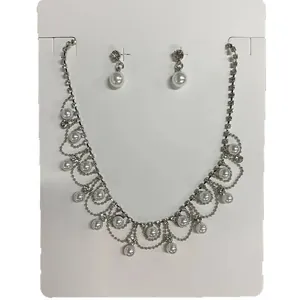 Elegant French vintage necklace earring set with rhinestones and scalloped pearl fringe decor