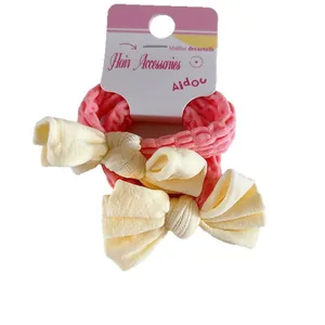 Ensemble d'élastiques à cheveux avec nœuds crème et design doux bicolore