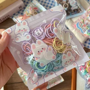 Pack of 200 colorful elastic hair bands for kids in a cute bunny frosted zipper bag