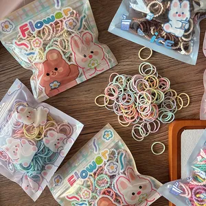 Close-up of colorful elastic hair bands for girls in cute decorative packaging