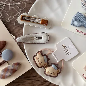 Set di fermagli per capelli con orsetto marrone e fiocchi in tessuto per bambine