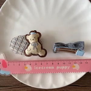 Set di fermagli per capelli con orsetto marrone e fiocco blu per bambine 5x6cm