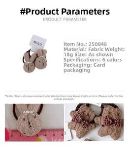 Détail d'élastiques en peluche avec motifs ours et lapin sur emballage carton