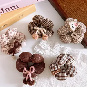 5-piece set of brown plaid and floral hair ties with cute bows and plush accents