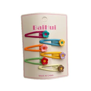 Set of 6 colorful matte flower BB hair clips for girls in candy colors on display card