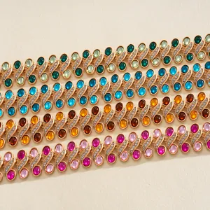 Detailed view of vintage court style resin rhinestone necklaces in multiple colors