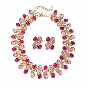 Elegant vintage court style gold-tone necklace set with pink resin stones and rhinestones