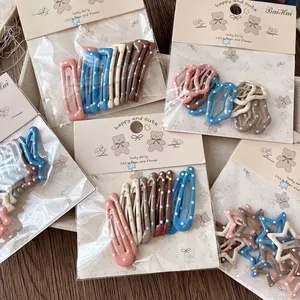 Lot de barrettes à pois colorées aux formes variées pour filles sur carte