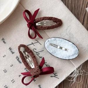 Set di fermagli per capelli a quadri blu e fiocco in maglia marrone per ragazze stile vintage