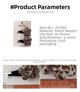 Detailed view of leopard print star hair clips with ribbon bows on a display card