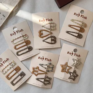 Set of 6 sweet vintage-style hair clip sets with heart and star patterns in brown tones