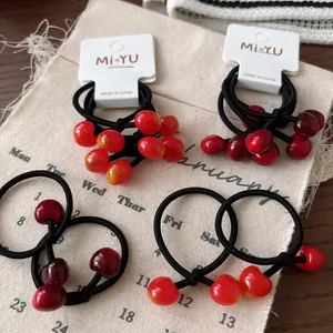 Elastici per capelli a ciliegia per ragazze con perle di resina rossa lucida in set da 3