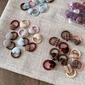 Set de gomas de pelo con botones de tela con patrones de cuadros y leopardo para niñas