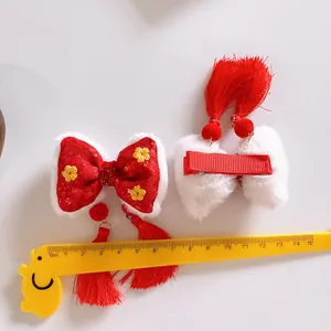 Lazos para el pelo de Año Nuevo con lentejuelas rojas y borde de piel sintética