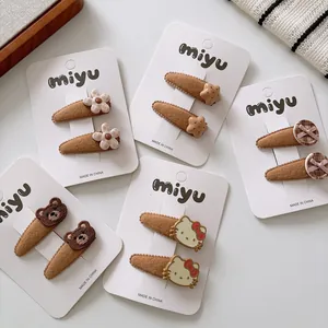 Brown velvet kids hair clips set featuring cute bears, flowers and bowknot designs