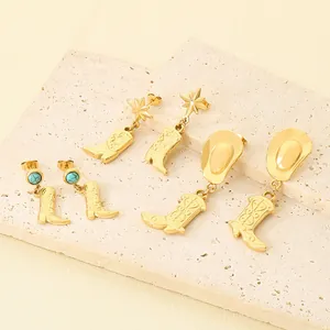 Set of gold stainless steel cowboy boot dangle earrings with turquoise and star studs