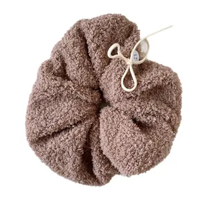 Brown teddy fleece hair scrunchie with white lace trim and button detail for women