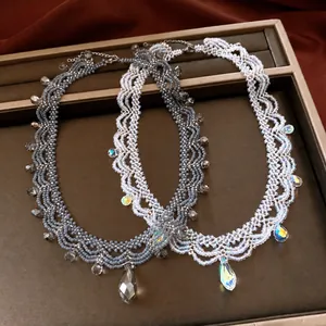 Elegant vintage glass beaded lace necklace with teardrop crystal pendant