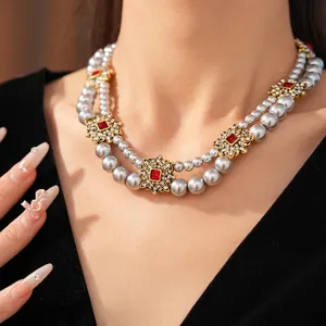 Vintage double-layer grey pearl necklace with rhinestone flower charms for women