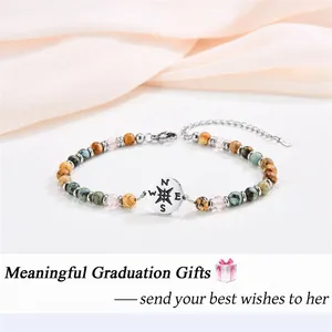Meaningful graduation gift compass bracelet with African turquoise and crystal beads