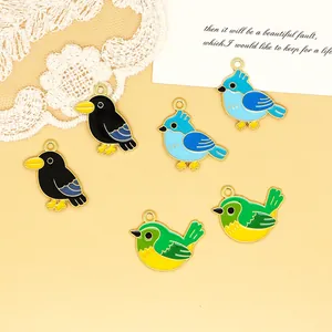 Detailed close-up showing colorful enamel bird charms for DIY accessories with gold plating