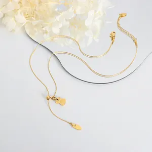 Golden bunny pendant necklace with carrot charm and adjustable length chain for women