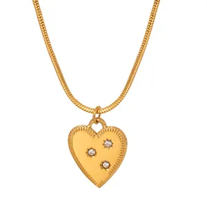 Elegant gold-plated heart pendant necklace with zircon stones on a fine snake chain