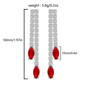 Detail view of silver-tone long earrings with red marquise stones and dimensions