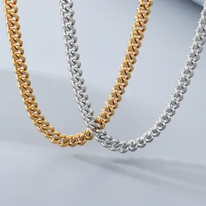 Macro detail of 8mm stainless steel cuban link chains in polished gold and silver