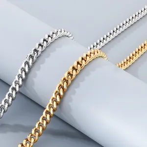 Macro view of 8mm stainless steel Cuban link chains in gold and silver for jewelry detail