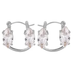 Close-up of silver steel hoop earrings with double marquise-cut crystals in four-prong setting