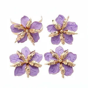 Set of four purple enamel wrinkled flower jewelry with gold metal accents
