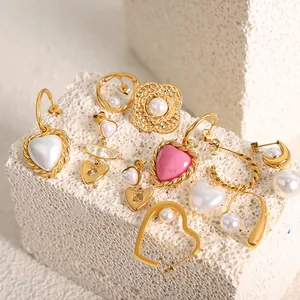 Elegant 18K gold-plated stainless steel earrings with hearts and pearls on stone