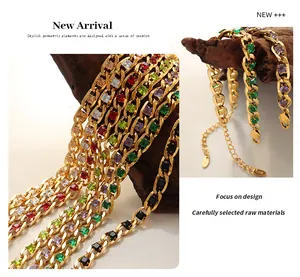 Detail of 18K gold plated Cuban chain bracelet with multi-colored cubic zirconia stones