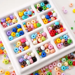Colorful glass seed beads set for DIY jewelry making in a white divided tray