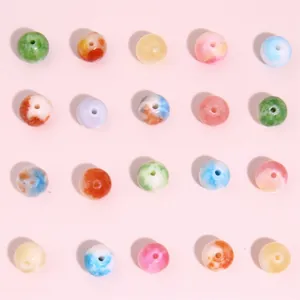 Mix of twenty colorful round natural stone beads with marble texture for DIY jewelry making