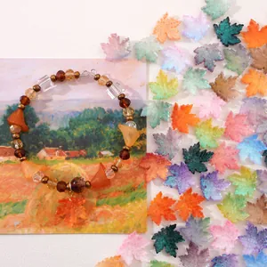 Handmade autumn maple leaf bracelet with amber glass beads and gold charms