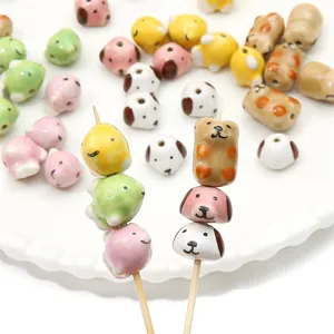 Handcrafted ceramic puppy beads and cartoon animal charms for DIY jewelry making